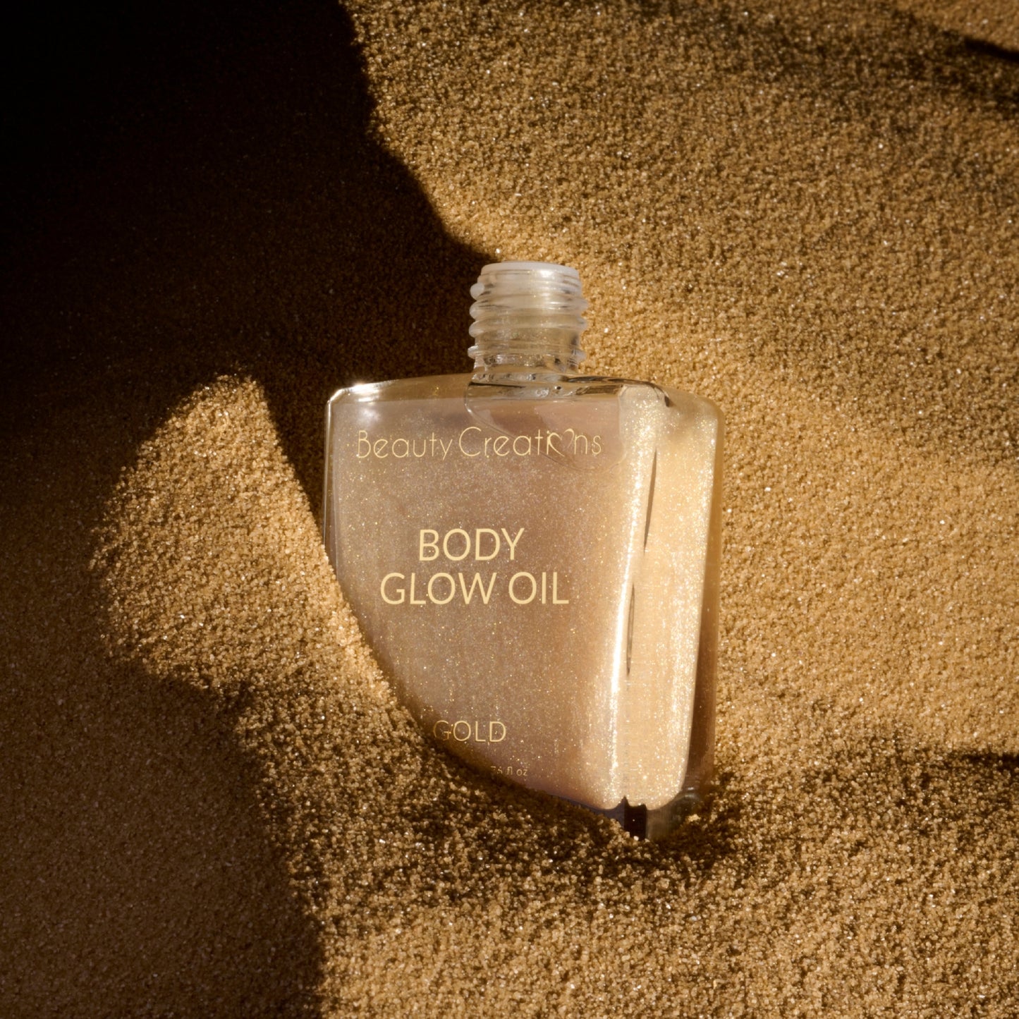 Aceite corporal iluminador Beauty Creations, 1,76 fl oz, color champán