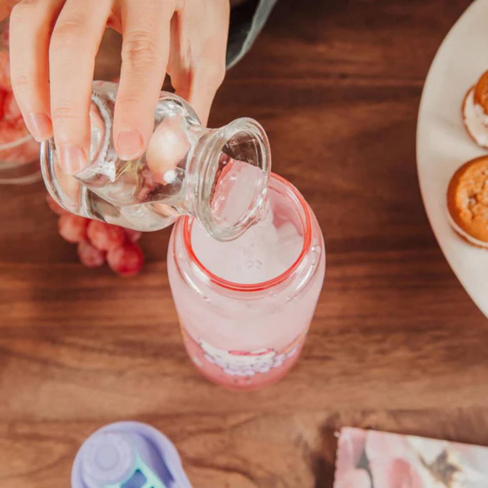 Sanrio Hello Kitty Rainbow Treats and Stars 28 oz Water Bottle with Lid - Multicolor