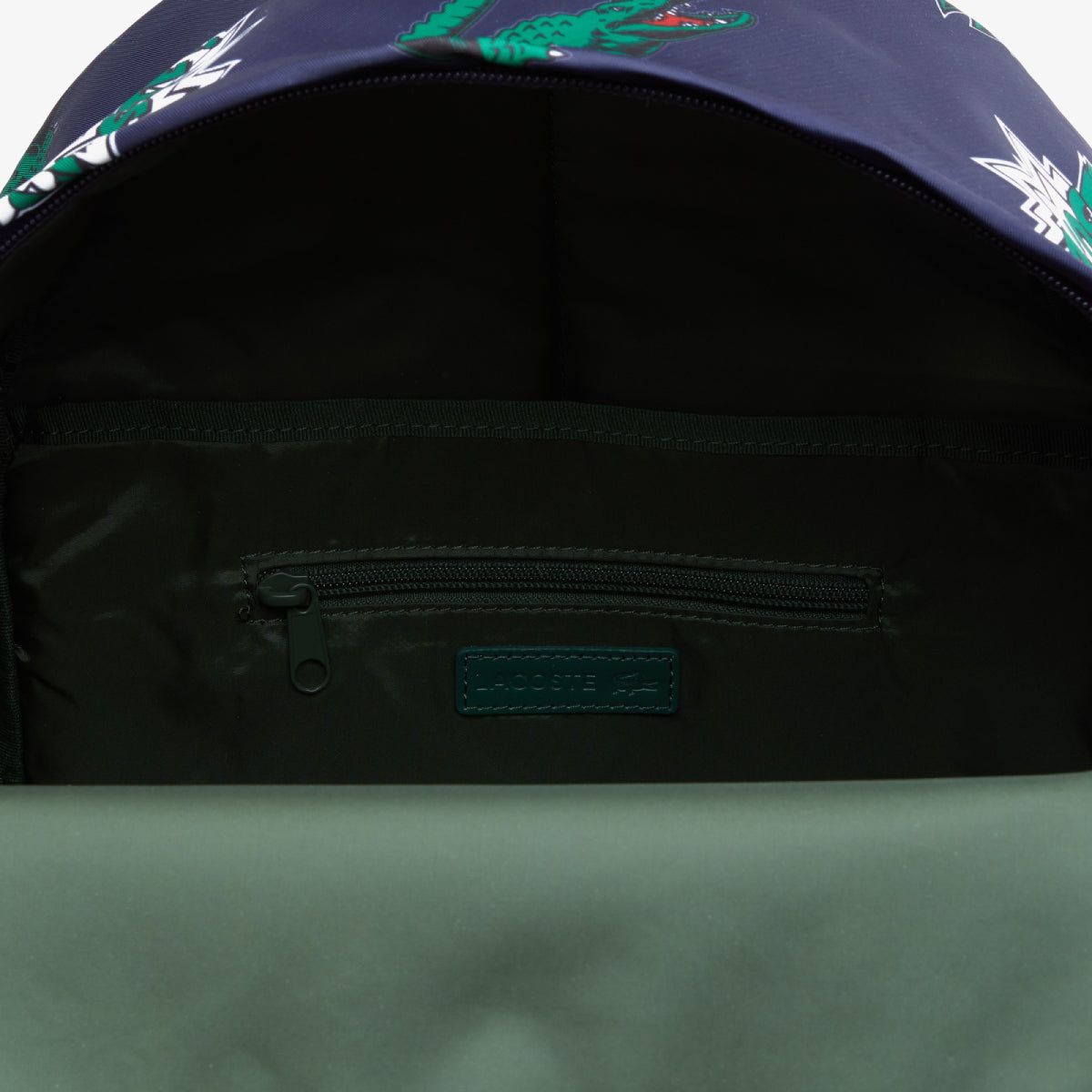 Mochila con estampado de efecto cómic de Lacoste, azul marino