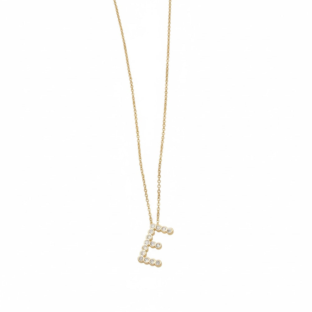 Collar con colgante de inicial "A" de cristal simple de 16,5" de Ettika en baño de oro de 18 k sobre latón y acero