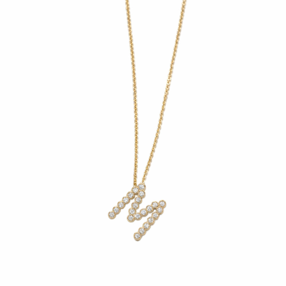 Collar con colgante de inicial "A" de cristal simple de 16,5" de Ettika en baño de oro de 18 k sobre latón y acero