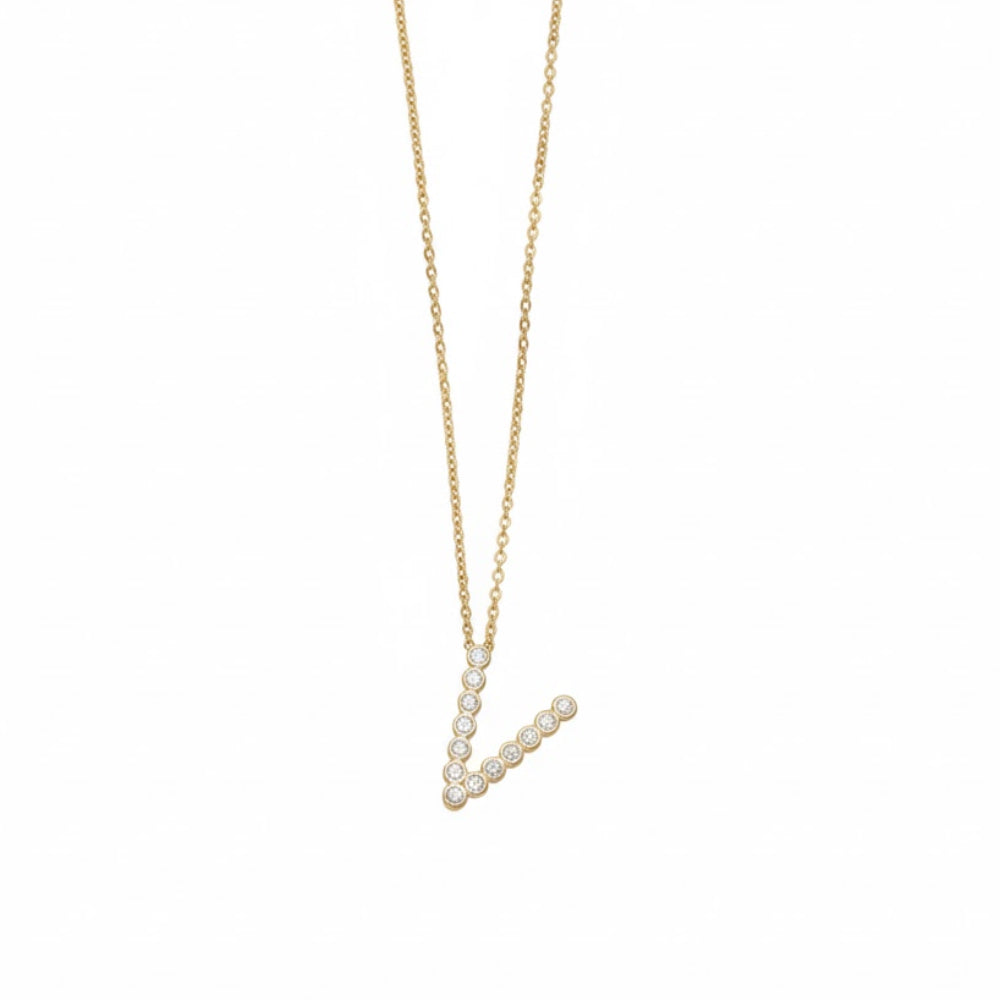 Collar con colgante de inicial "A" de cristal simple de 16,5" de Ettika en baño de oro de 18 k sobre latón y acero