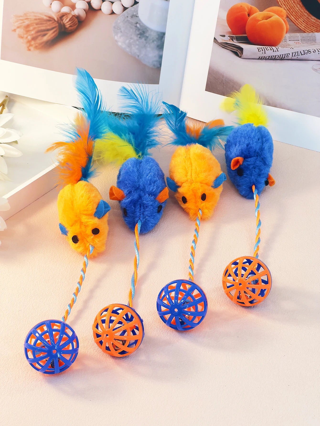 A stuffed mouse with a string sounding bell ball teases the Cat Mouse Cat Toy Feather Mouse Cat self-hi toy