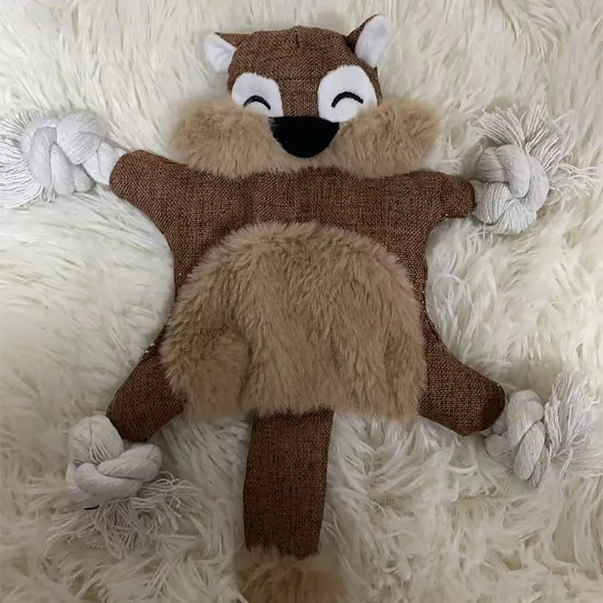 1 squeaky squirrel dog toy - tough chew and teething toy with squeaky sound and knots for aggressive chewers