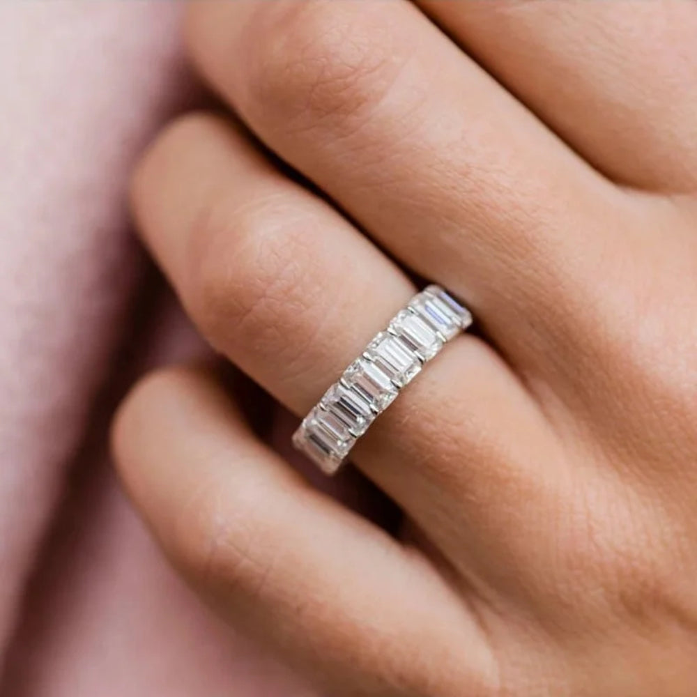 Anna Zuckerman Grace 55 Women's 5 ct. Diamond Crystalline Emerald Cut Eternity Ring in Platinum-Plating over 925 Sterling Silver