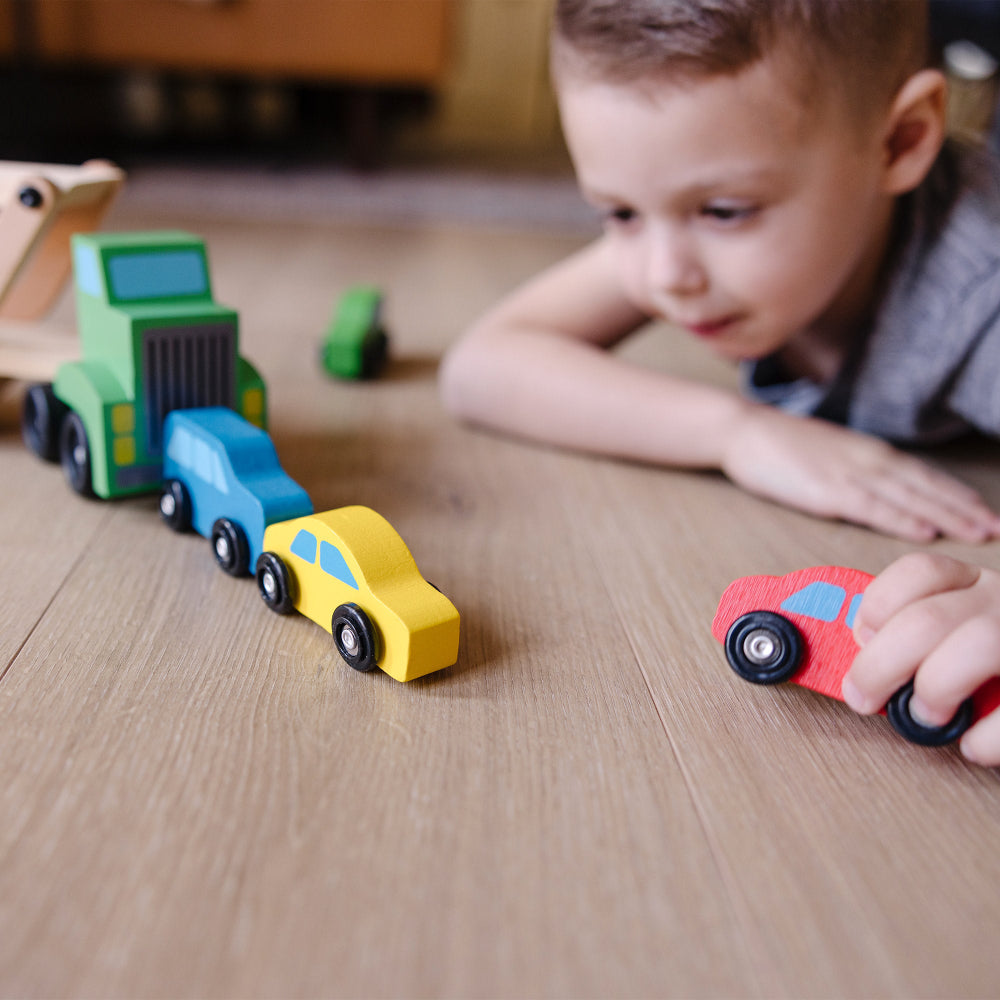 Melissa & Doug Wooden Car Carrier Playset with 1 Truck and 4 Cars