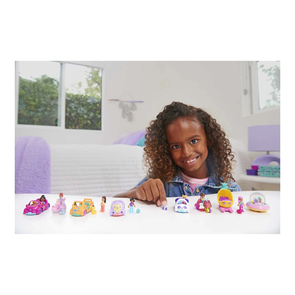 Conjunto de muñeca en miniatura y vehículo de fundición a presión Polly Pocket con minimascota (surtido)