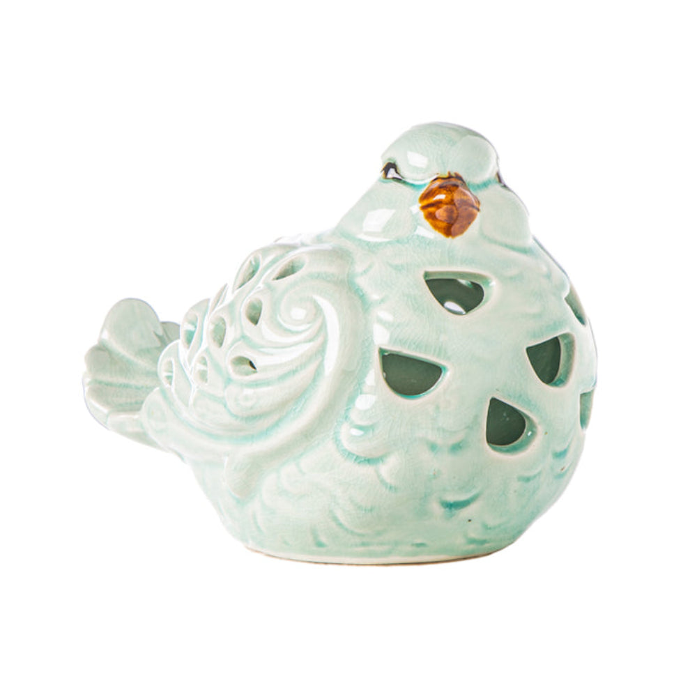 Urban Trends Collection 7.25" Ceramic Sitting Bird Figurine with Cut Out Design - Baby Blue