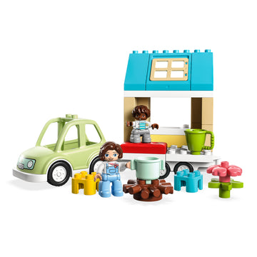 Juego de construcción LEGO Duplo Casa familiar sobre ruedas (31 piezas)