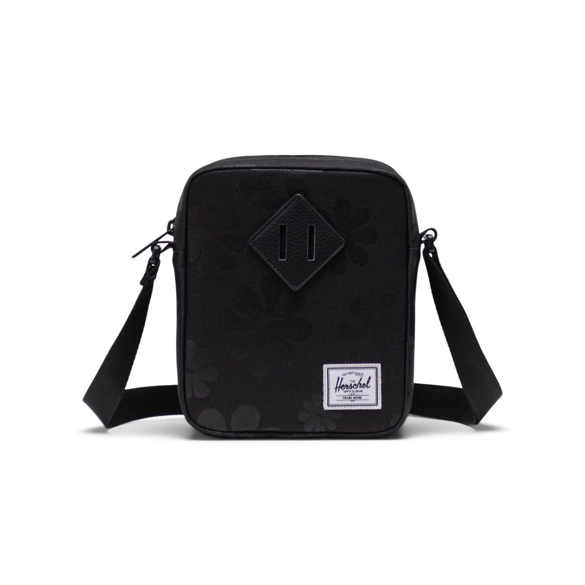 Bolso bandolera Heritage de Herschel: diseño floral en color negro