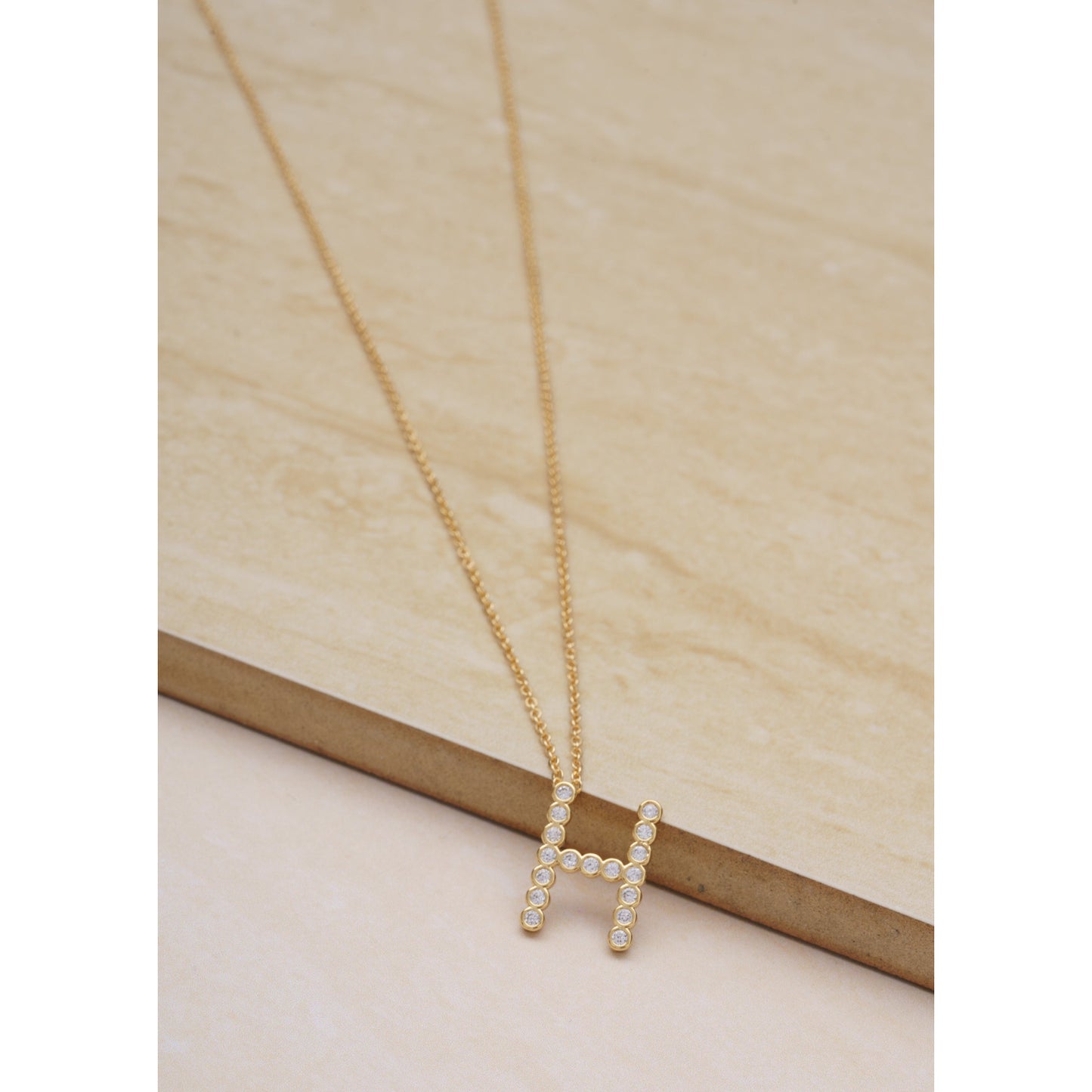 Ettika 16.5" Simple Crystal Initial "H" Pendant Necklace in 18k Gold Plate Over Brass and Steel