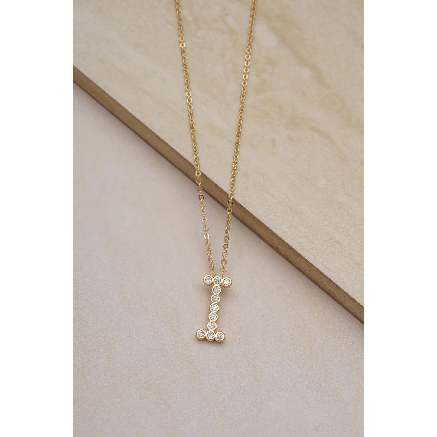 Ettika 16.5" Simple Crystal Initial "I" Pendant Necklace in 18k Gold Plate Over Brass and Steel