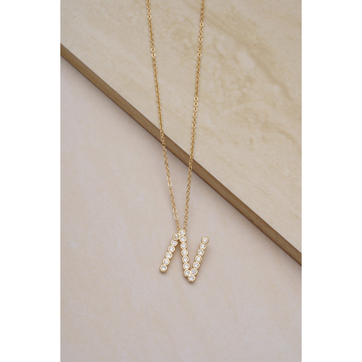 Ettika 16.5" Simple Crystal Initial "N" Pendant Necklace in 18k Gold Plate Over Brass and Steel