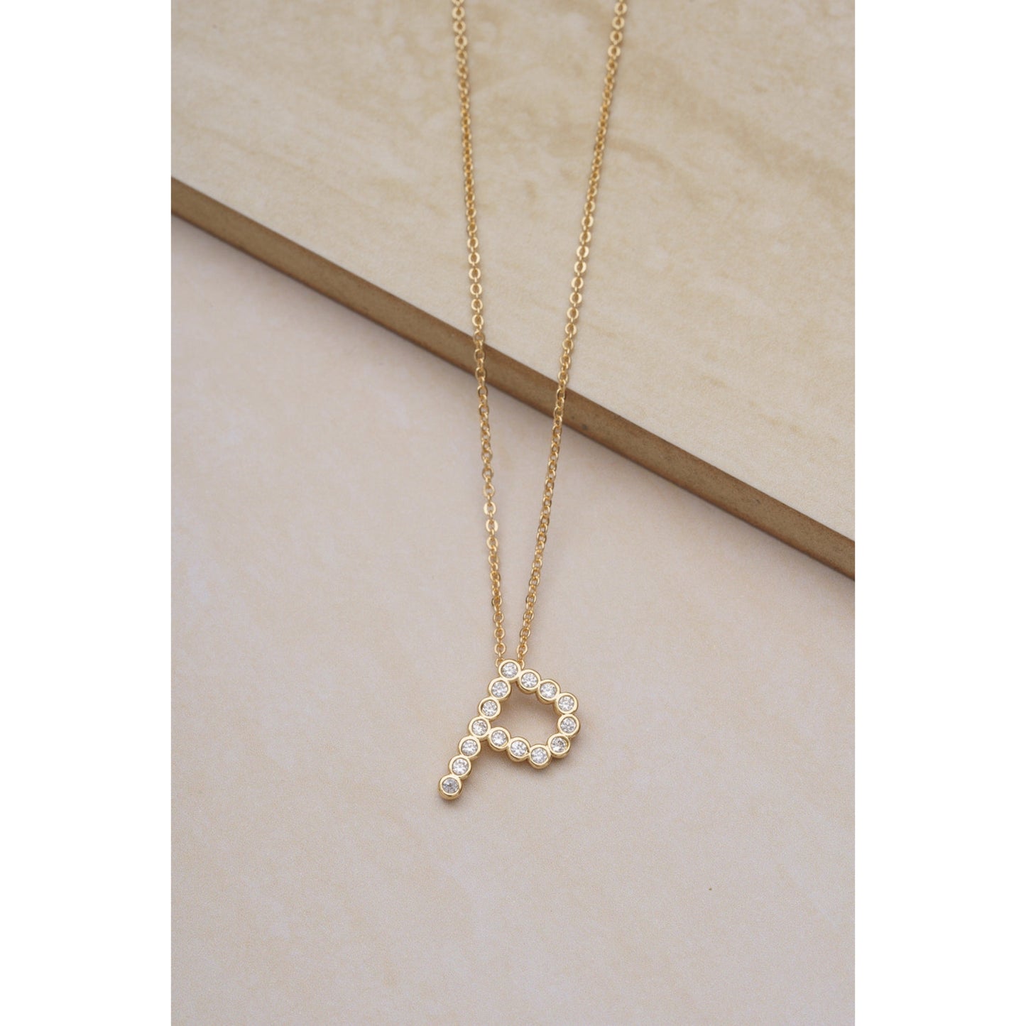 Ettika 16.5" Simple Crystal Initial "P" Pendant Necklace in 18k Gold Plate Over Brass and Steel