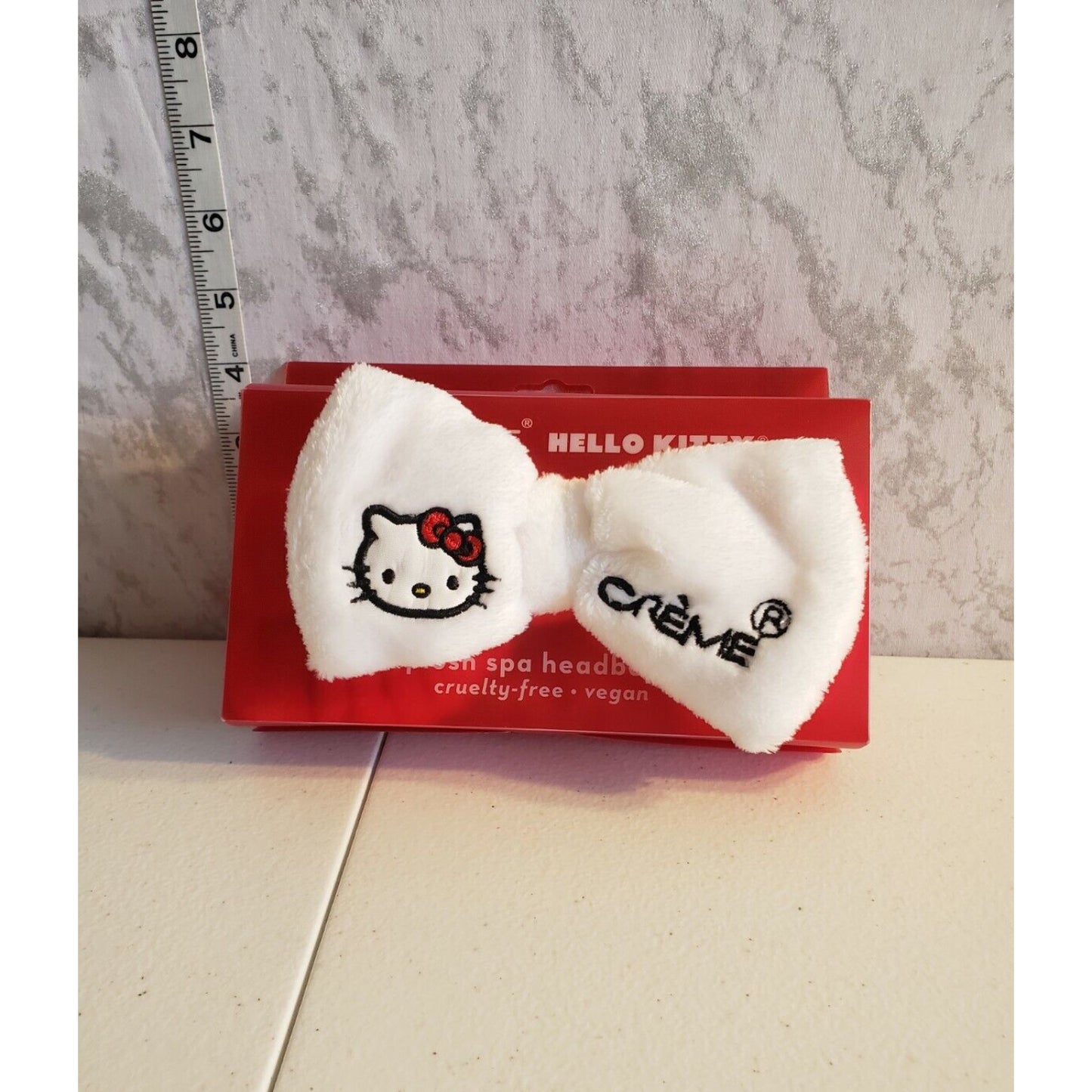 The Creme Shop x Hello Kitty Bow Plush Spa Headband - White