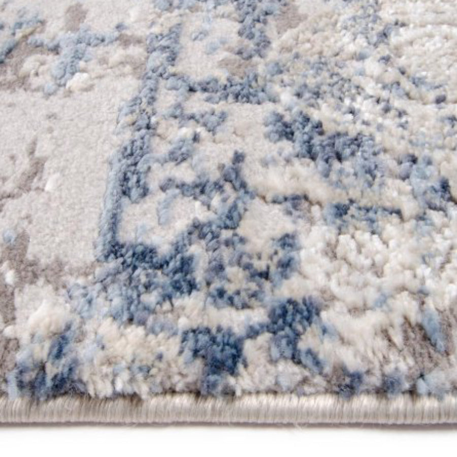 Tufan 5' 3" x 7' 7" Bella-01 Power Loomed Rectangle Rug in Polyester and Polypropylene - Silver/Blue