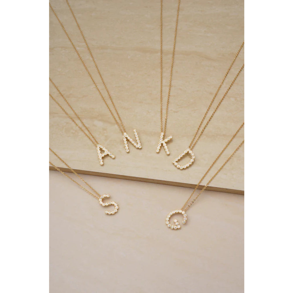 Ettika 16.5" Simple Crystal Initial "K" Pendant Necklace in 18k Gold Plate Over Brass and Steel