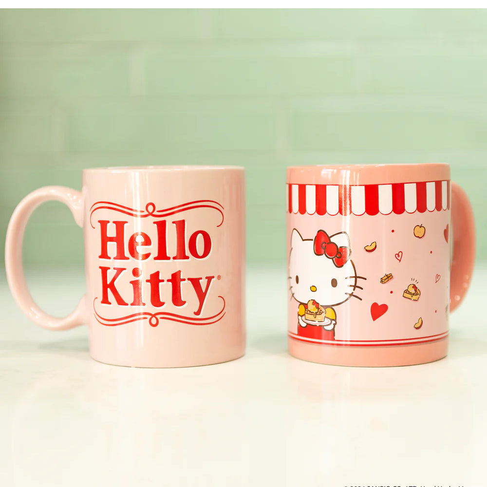 Uncanny Brands CM3KITHK1 Hello Kitty Single Cup Coffee Maker Gift Set with 2 Mugs - Peach