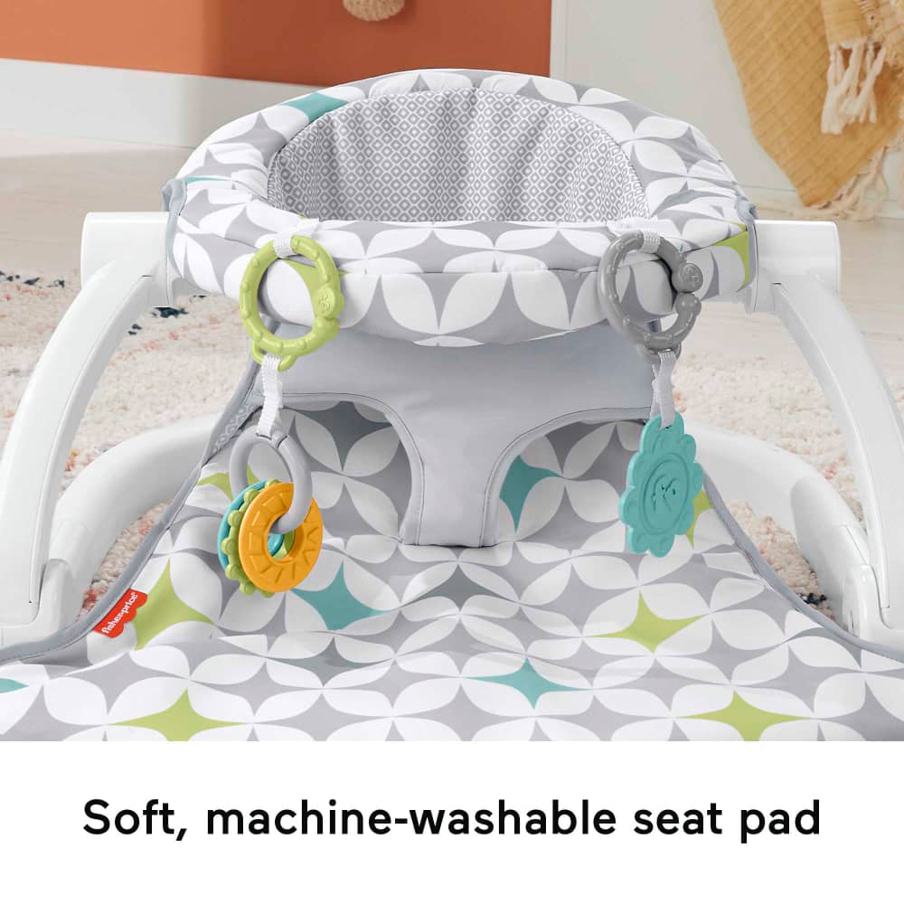 Silla de bebé portátil con asiento de piso Sit-Me-Up de Fisher-Price con 2 juguetes - Starlight Burst