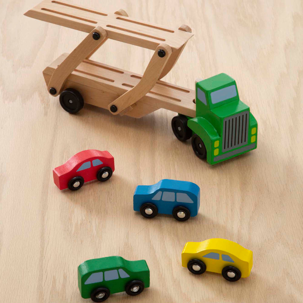 Melissa & Doug Wooden Car Carrier Playset with 1 Truck and 4 Cars