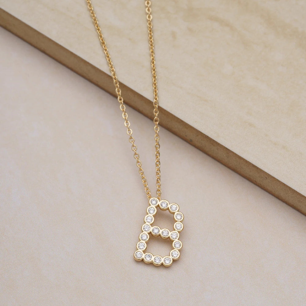 Collar con colgante de inicial "A" de cristal simple de 16,5" de Ettika en baño de oro de 18 k sobre latón y acero