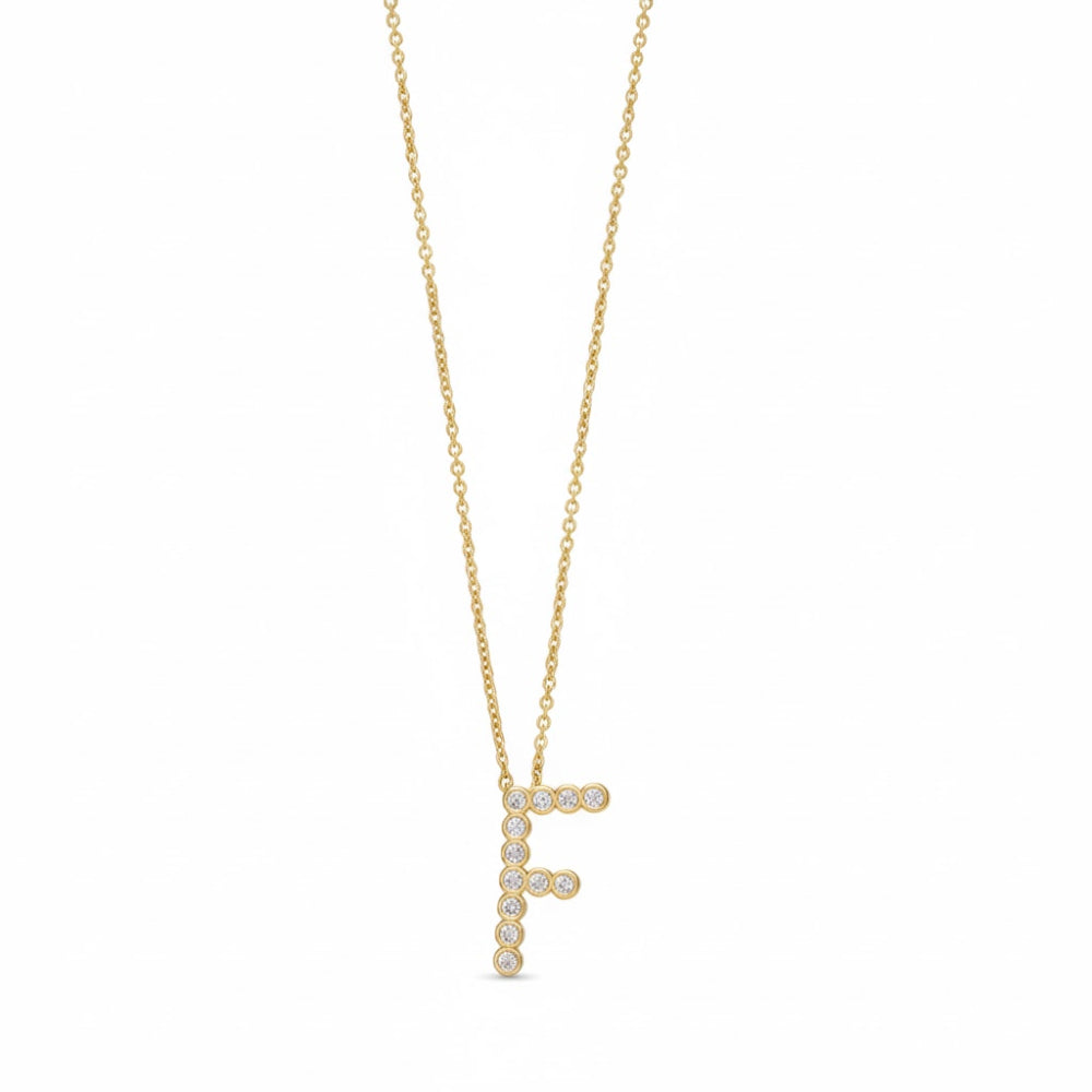 Collar con colgante de inicial "A" de cristal simple de 16,5" de Ettika en baño de oro de 18 k sobre latón y acero