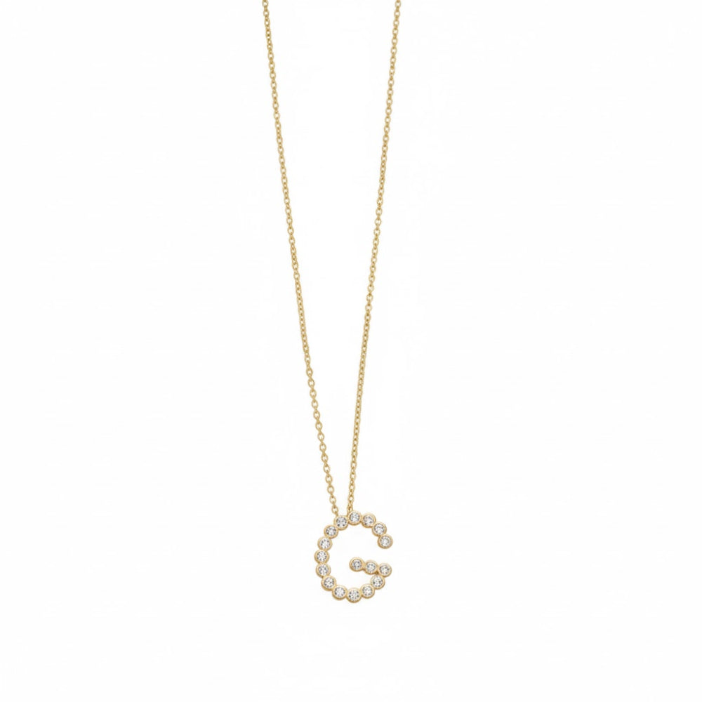 Collar con colgante de inicial "A" de cristal simple de 16,5" de Ettika en baño de oro de 18 k sobre latón y acero