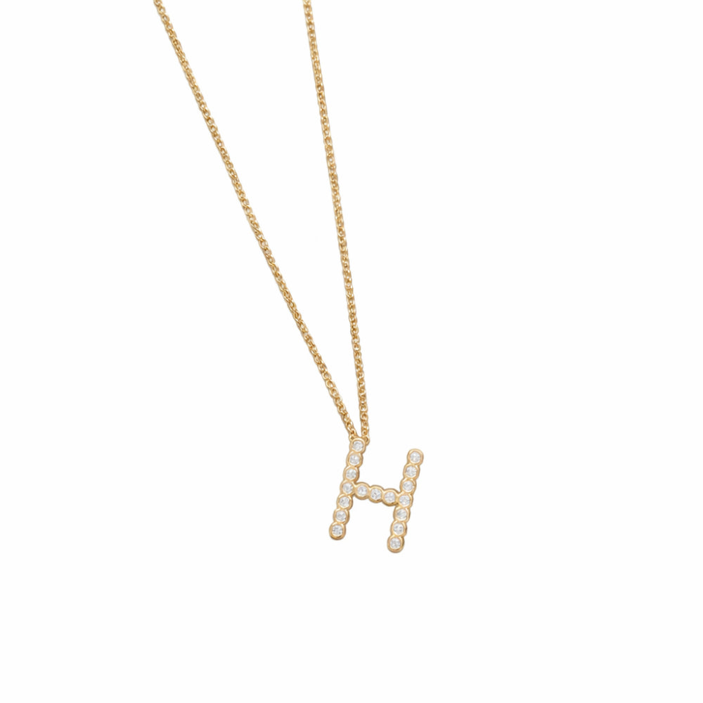 Collar con colgante de inicial "A" de cristal simple de 16,5" de Ettika en baño de oro de 18 k sobre latón y acero