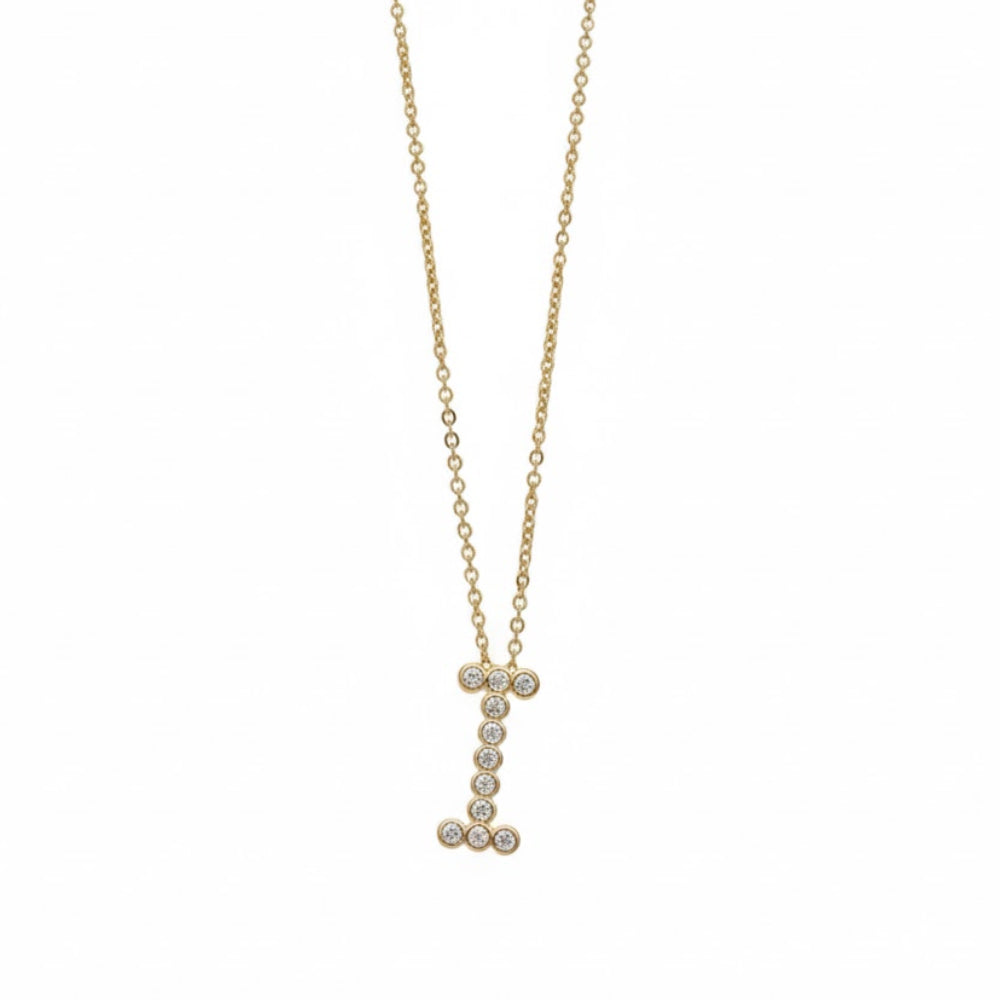 Collar con colgante de inicial "A" de cristal simple de 16,5" de Ettika en baño de oro de 18 k sobre latón y acero