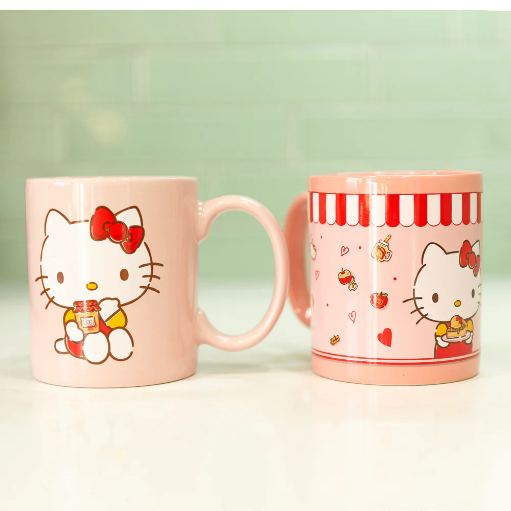 Uncanny Brands CM3KITHK1 Hello Kitty Single Cup Coffee Maker Gift Set with 2 Mugs - Peach