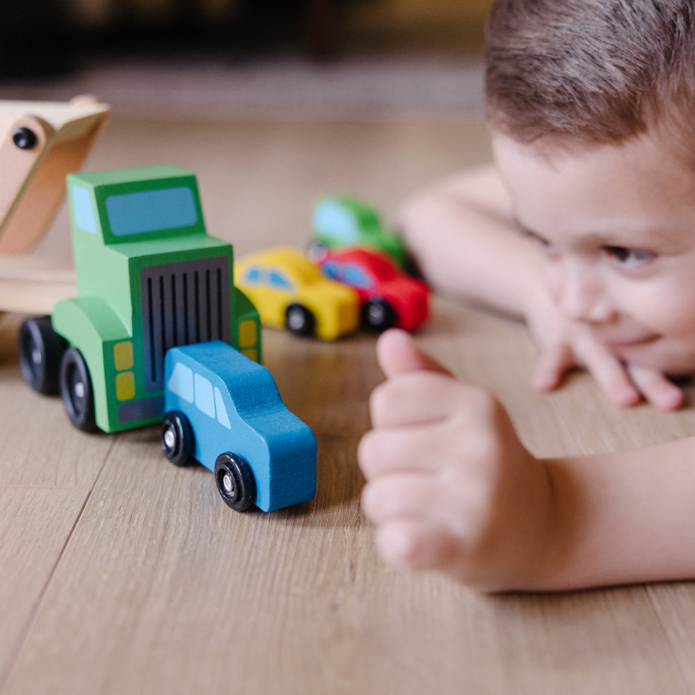 Melissa & Doug Wooden Car Carrier Playset with 1 Truck and 4 Cars